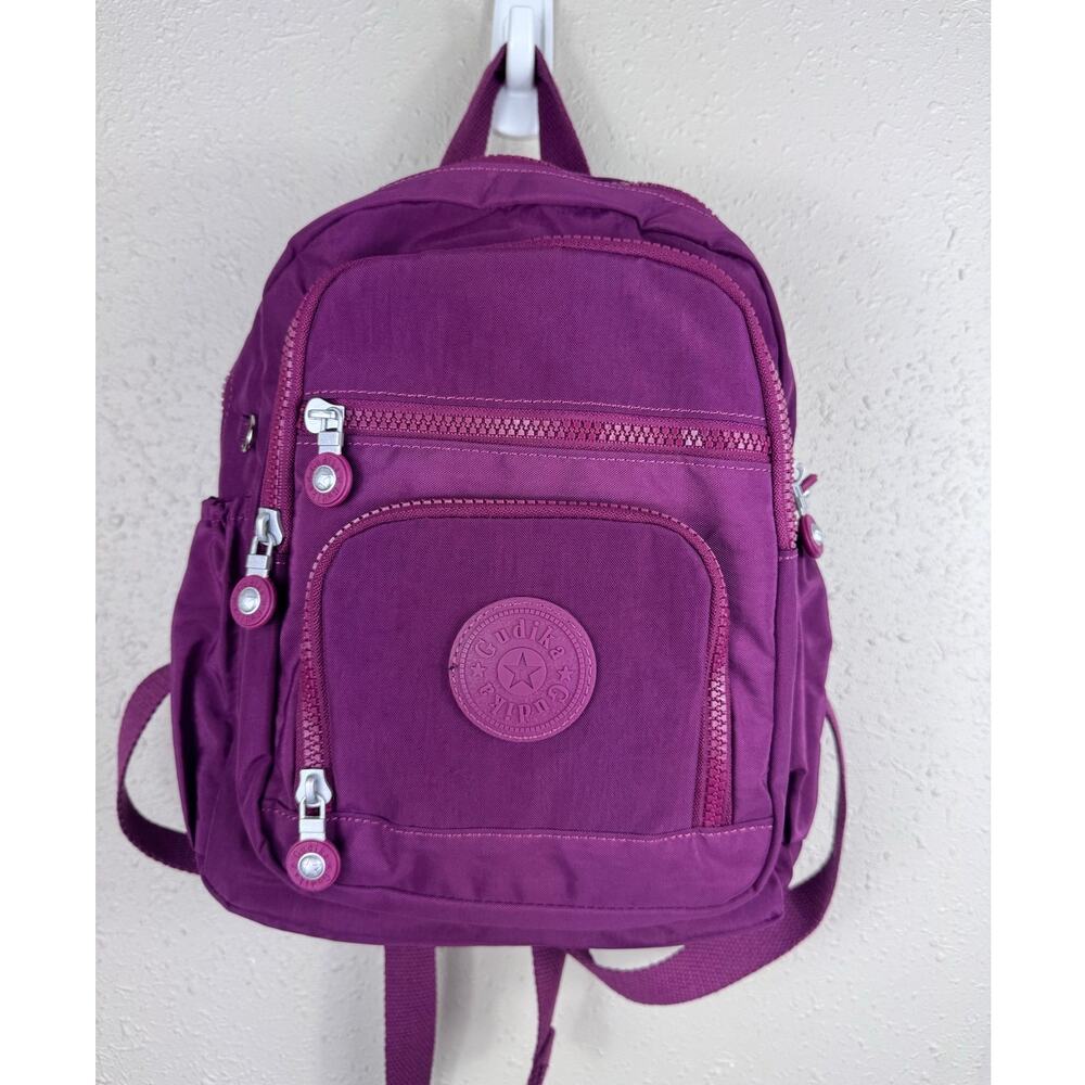 Gudika Mini Waterproof Backpack in a Magenta Color